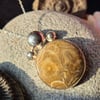 Handmade sterling silver and fossilised coral pendant