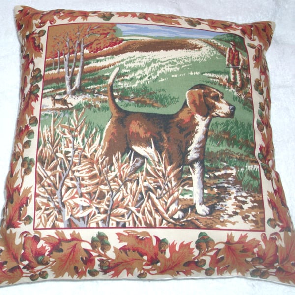 A Beagle waiting patiently in a field cushion