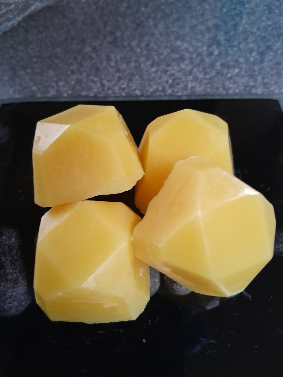 4 pack wax melts, orange oil, natural beeswax, organic essential oil.