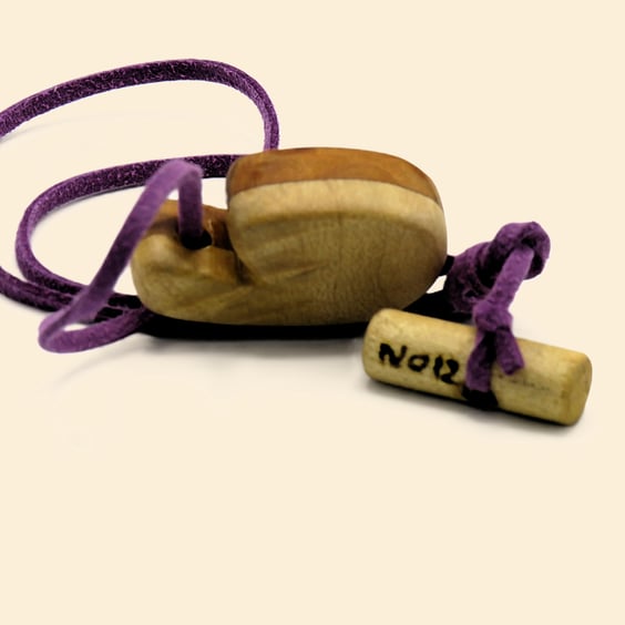 Carved wood Colon shaped pendant with purple necklace: SKU-N12