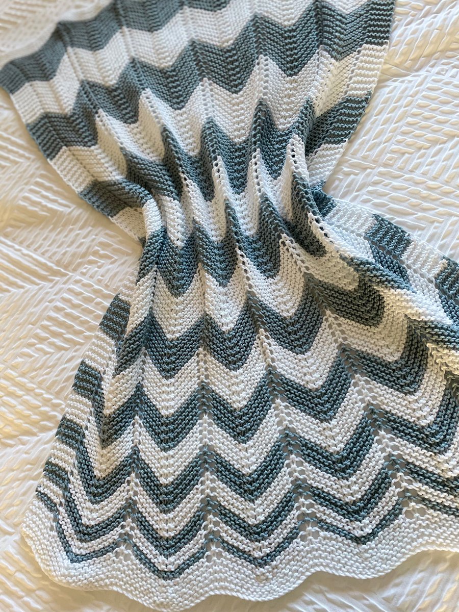 Blue and white striped baby blanket in cotton mix yarn 