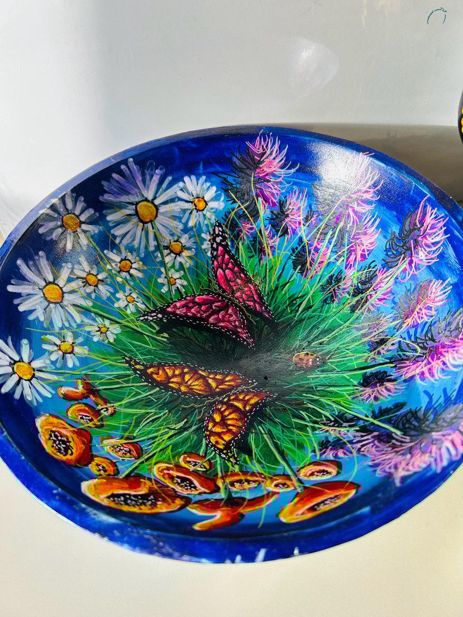A hand painted and sealed Wooden bowl by Andrew Jenkins 