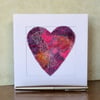 Embroidered up-cycled fabric heart Art card. 
