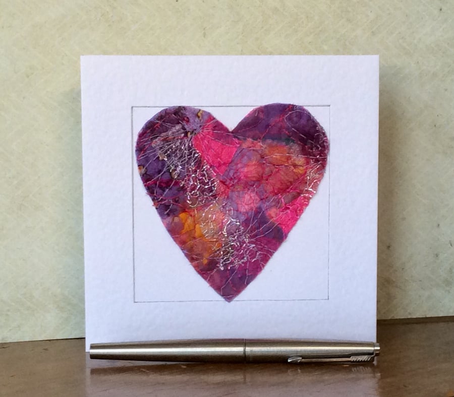 Embroidered up-cycled fabric heart Art card. 
