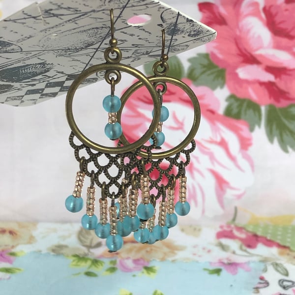 Sky blue and peach chandelier earrings 