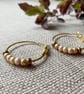 Pearlised bead hoop earrings, gold plated