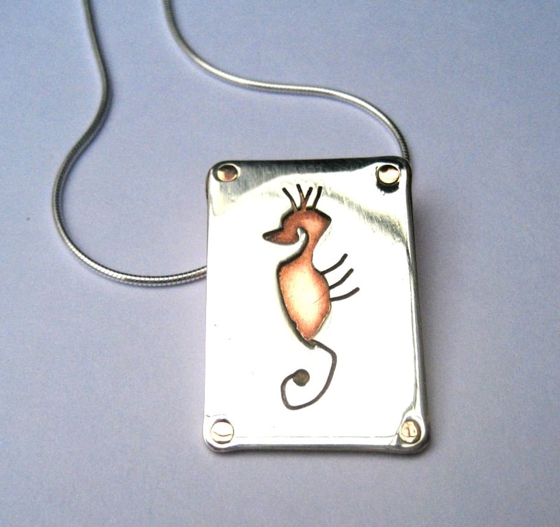 Seahorse pendant in sterling silver and copper
