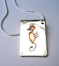 Seahorse pendant in sterling silver and copper