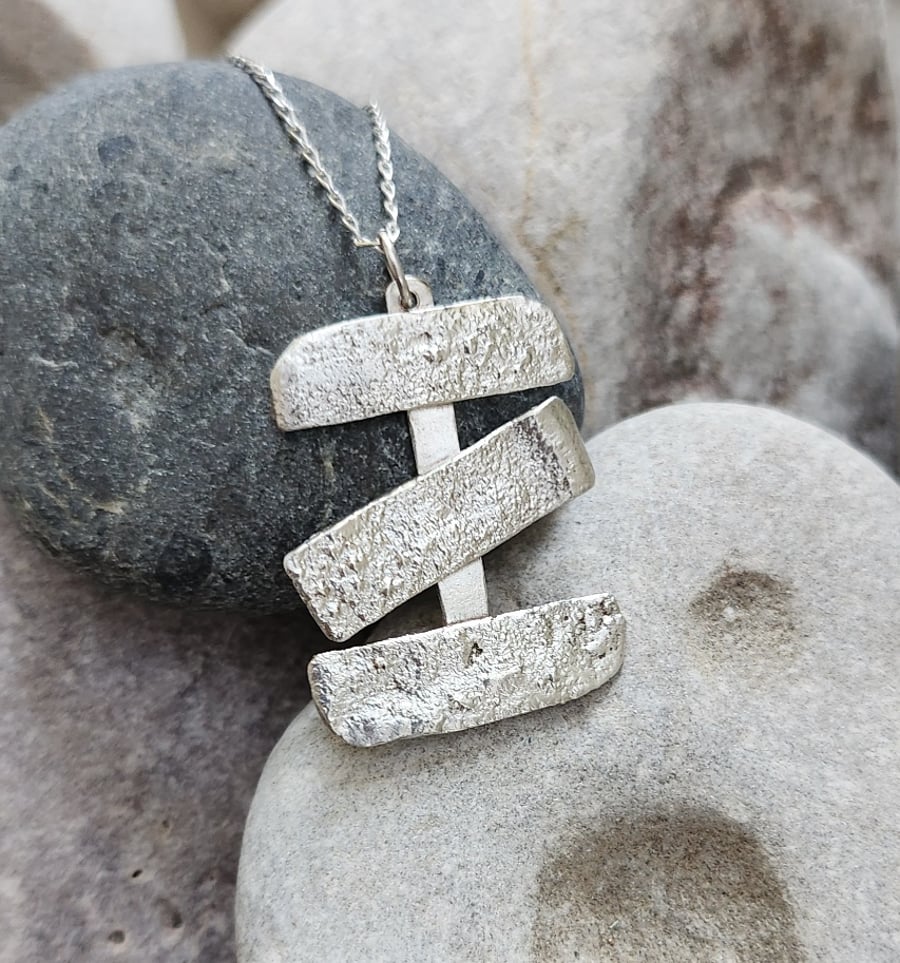 Triple cross reticulated sterling silver pendant