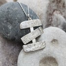 Triple cross reticulated sterling silver pendant