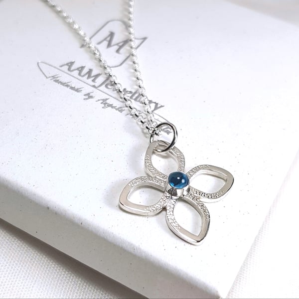 Silver and Blue Topaz Flower Pendant Necklace