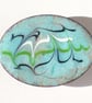 enamel brooch - scrolled blue, green, white over turquoise - Image 1