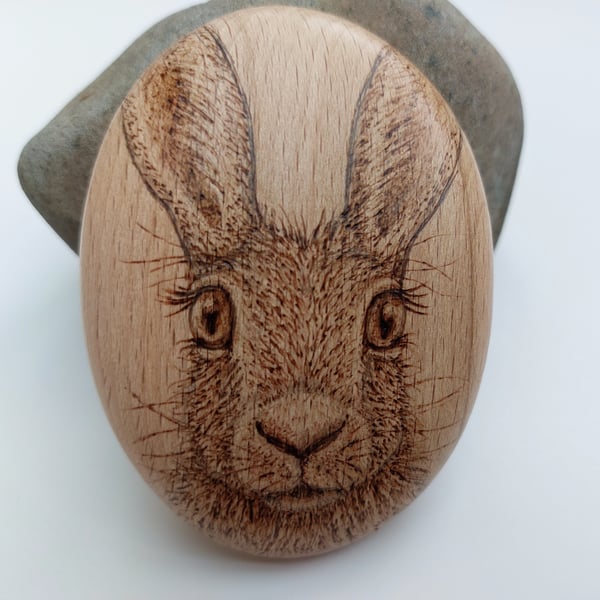 Hare pyrography wooden pebble 