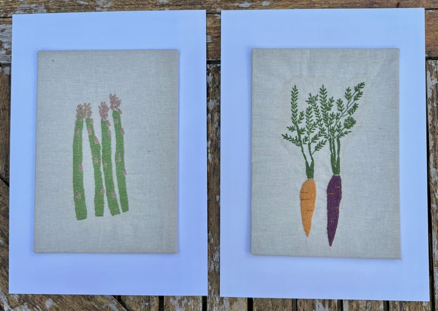 Hand embroidered asparagus and carrot companion pictures.