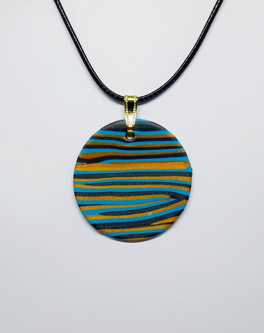 Lightweight polymer clay pendant 