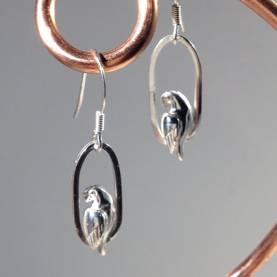 Silver parrot swing earrings