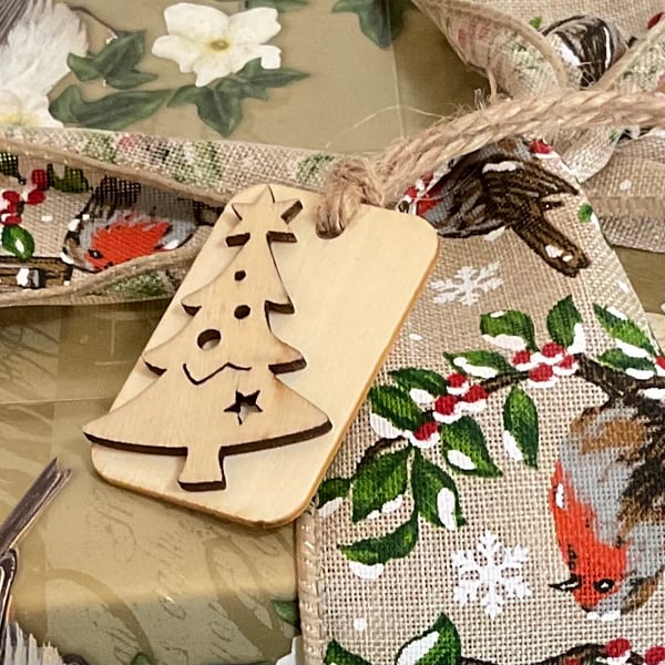 Set of five wooden Christmas tree gift tags.