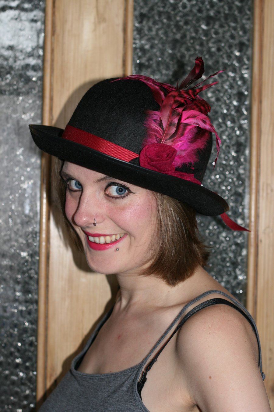 Black bowler steampunk hat with roses and feathers