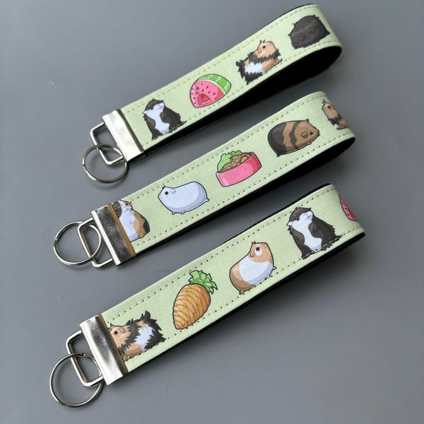 Guinea pig wristlet keychain. Guinea pig keyring. Guinea pigs wrist strap keyrin