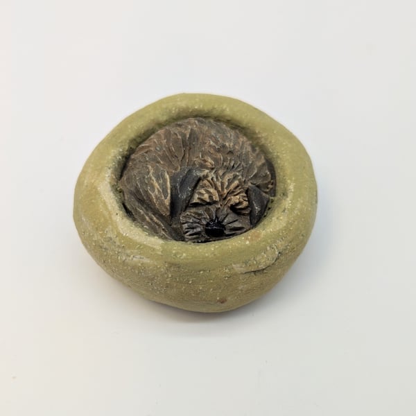 Yorkshire Pudding Border Terrier Mini Sculpture - green bed