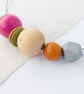 Isla - Hot pink, olive green, burnt orange necklace with grey hexagonal bead - Image 7