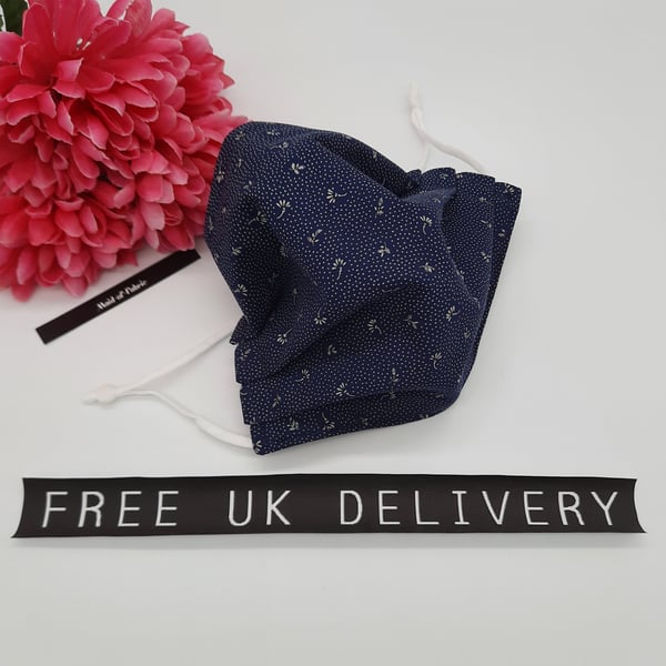 Face mask,  medium,  3 layer,  adjustable, washable in navy flower and dot 