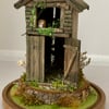 Barn miniature diorama with tiny barn owl