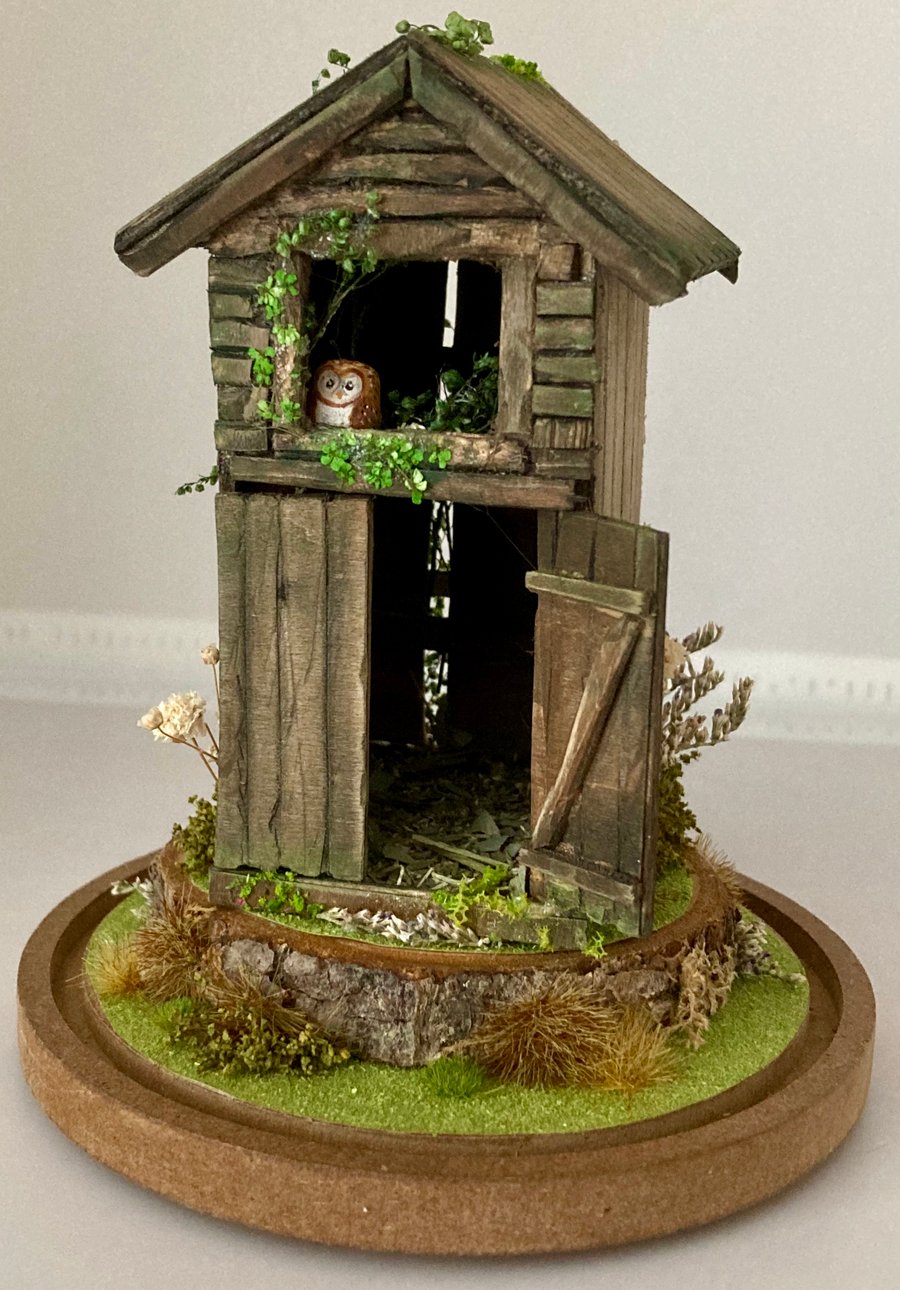 Barn miniature diorama with tiny barn owl