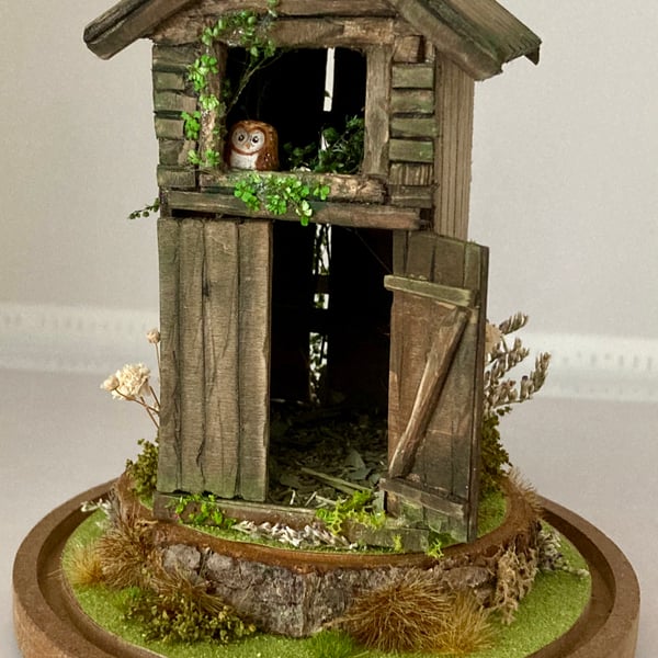 Barn miniature diorama with tiny barn owl