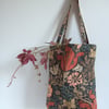 Tote bag in an autumnal vintage print by Morris and Co with foldaway pouch