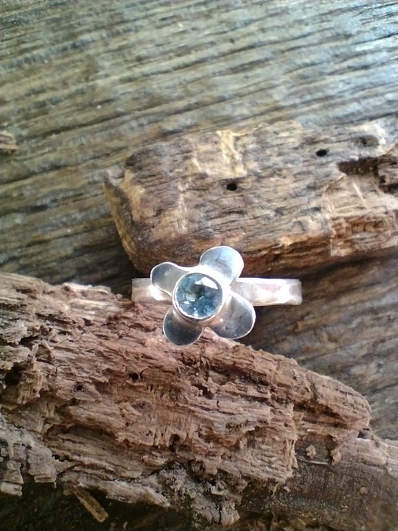 Sterling silver blue topaz flower ring