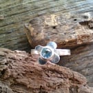 Sterling silver blue topaz flower ring