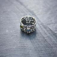 Sterling Silver Ring with Drilled Pattern and Peridot and Topaz Gems
