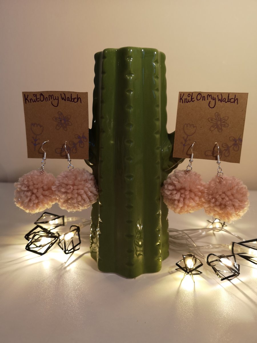 Small light pink glittery pom pom earrings