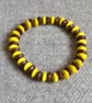 Yellow and Brown Rondelle Elastic Bracelet - Image 1