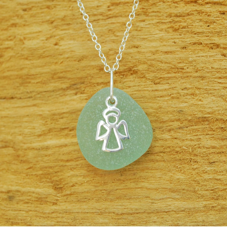 Aquamarine sea glass pendant with angel charm