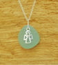 Aquamarine sea glass pendant with angel charm
