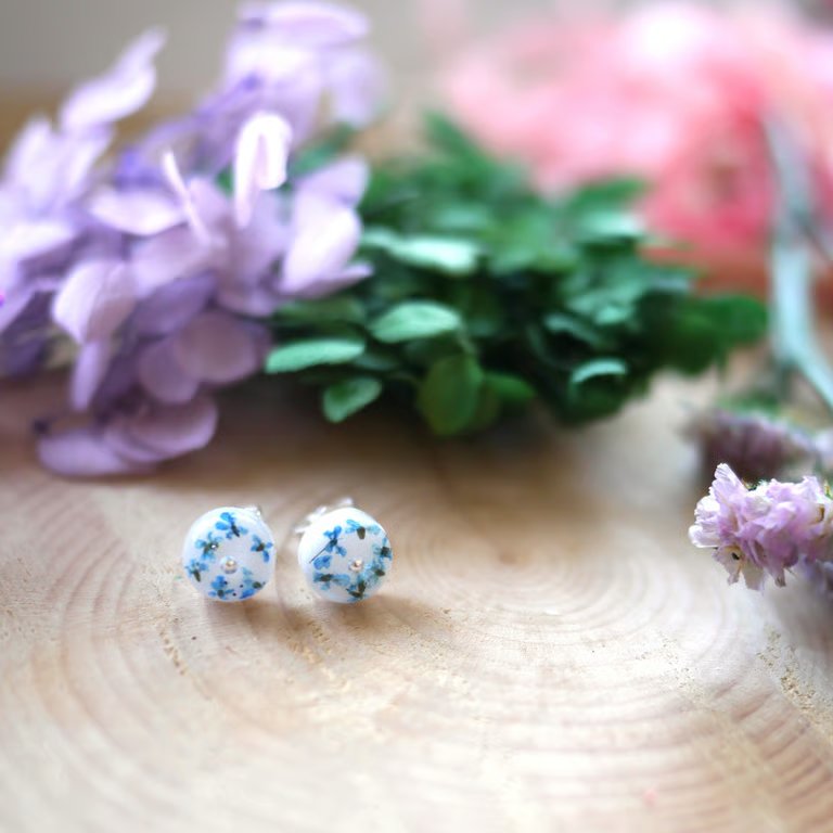 White resin, real flowers, and silver gem stud earrings with sterling silver