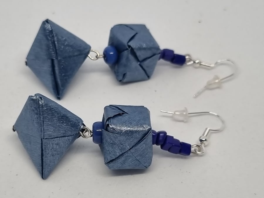 Origami earrings created with blue pearlescent shoyu paper