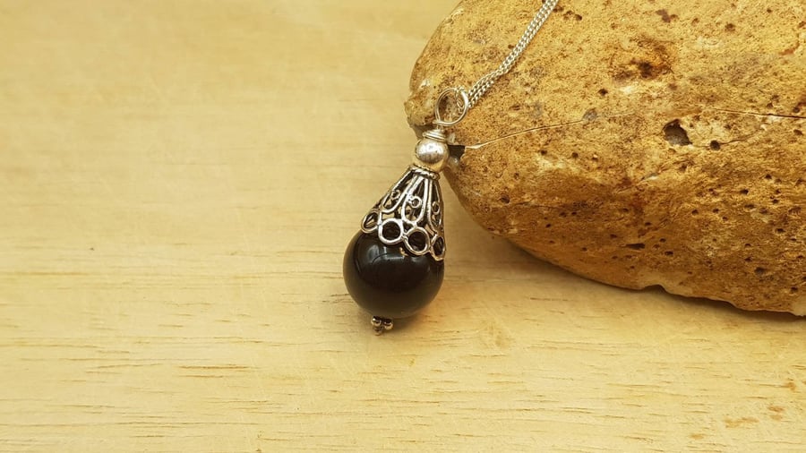 Black Onyx cone Pendant. December birthstone. 7th anniversary