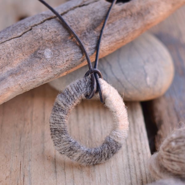 Handmade sea shell pendant necklace - handspun Orkney wool - leather cord