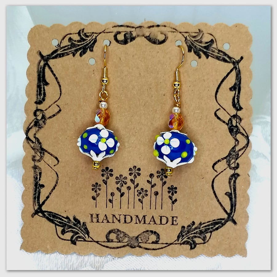 Elegant Gold-plated earrings with Venetian Murano blue glass flower beads