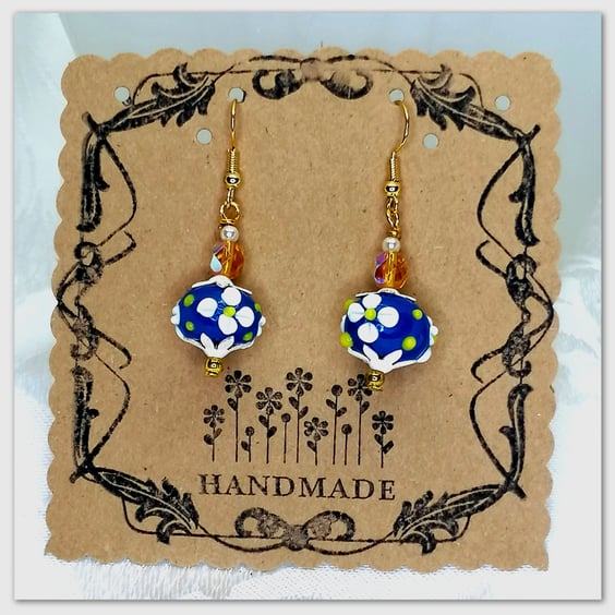 Elegant Gold-plated earrings with Venetian Murano blue glass flower beads