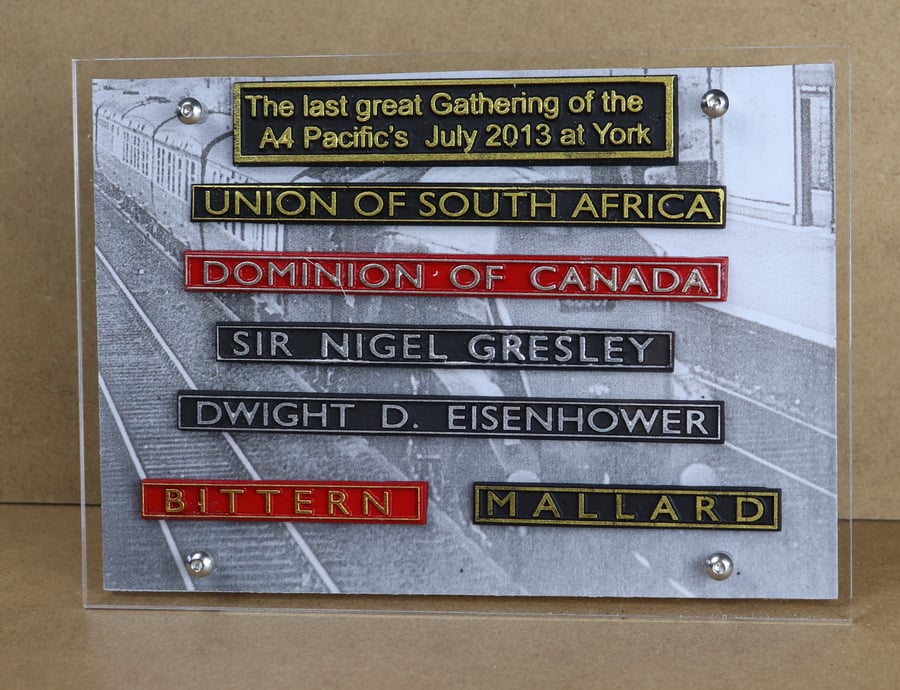 Framed collection of nameplates of "The Great Gathering" 
