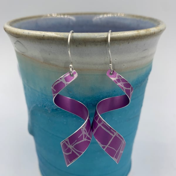 Pink patterned aluminium spiral dangly earrings 