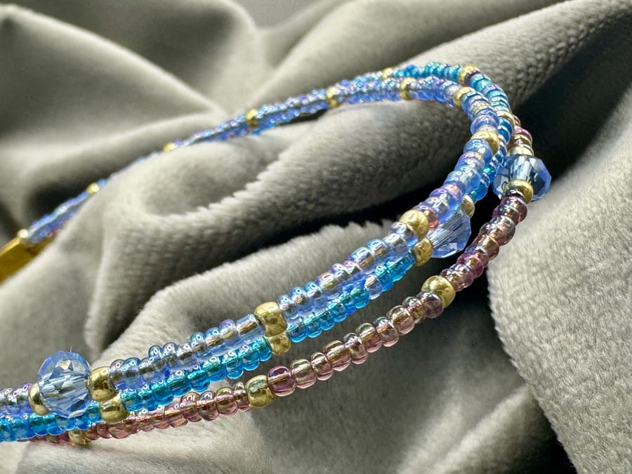 Blue glass multi strand seed bead bracelet. 