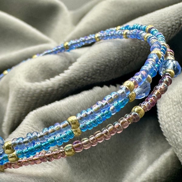 Blue glass multi strand seed bead bracelet. 