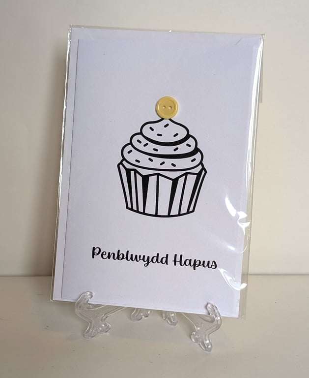 Penblwydd Hapus Happy Birthday greetings card cake with a button candle