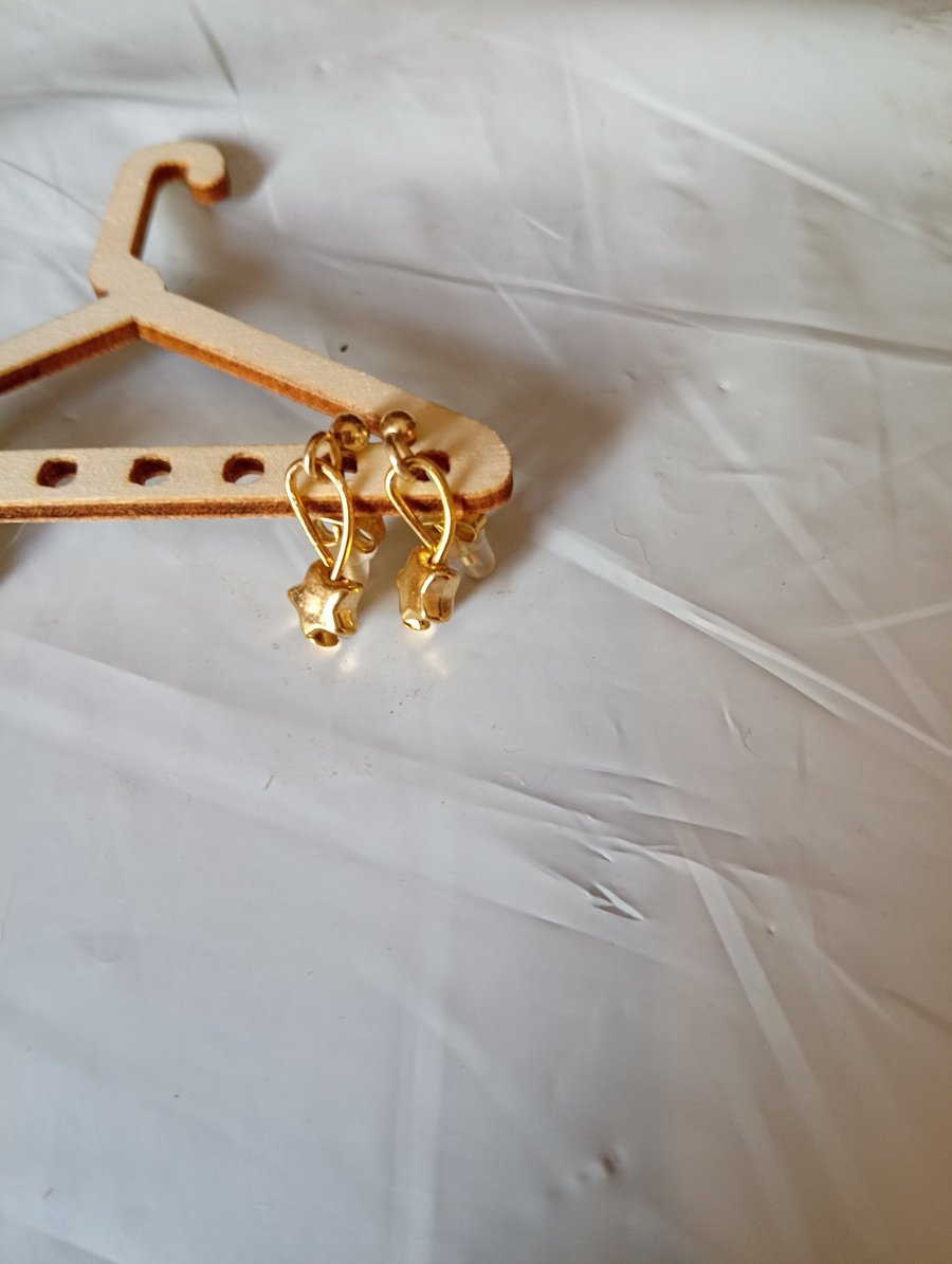 Image of Star gold plated dangle earrings 