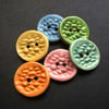 Set of six little handmade ceramic buttons